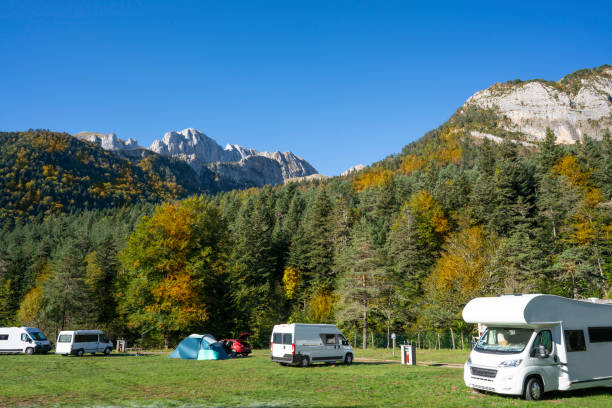 Camping in Valle de Hecho at Selva de Oza camper van in autumn,