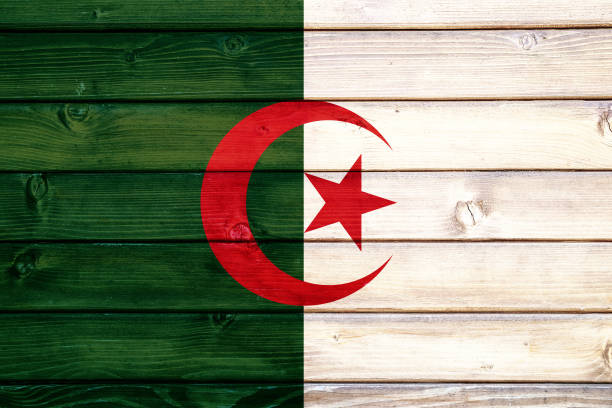 Flag of Algeria on wooden surface