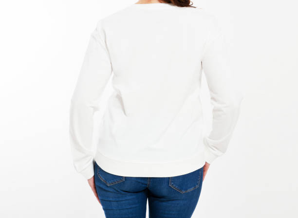 istock back view White pullover on a young woman in shorts closeup, isolated, with copy space, mockup. 1356158485