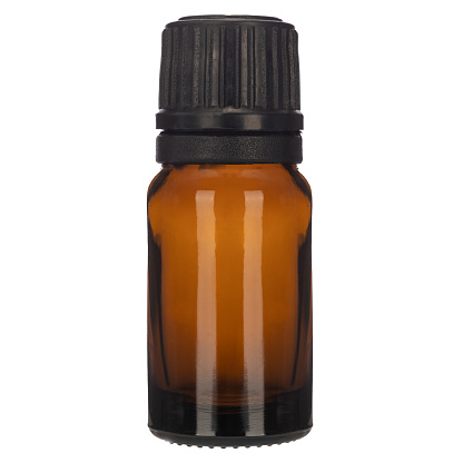 Real brown bottle of essential oil. Mock-up of cosmetic or medical bottle.