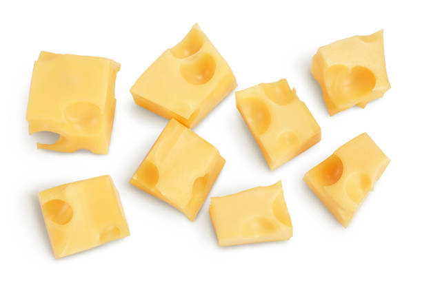 istock cubes of cheese isolated on white background with clipping path. Top view. Flat lay 1356160025