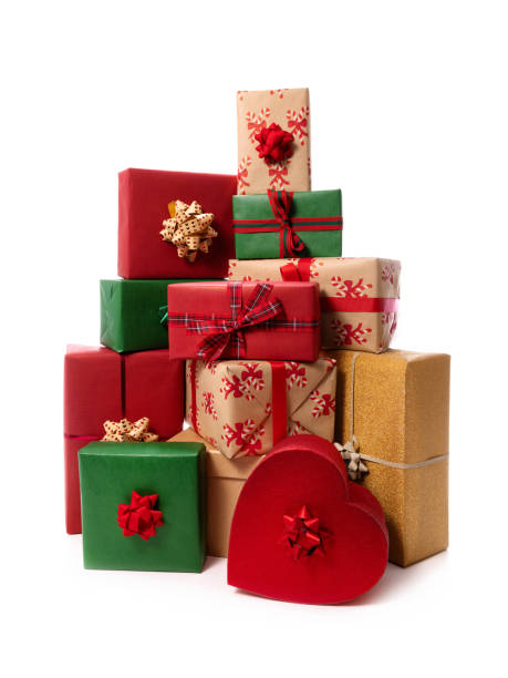 stack of christmas gifts isolated on white background stock photo