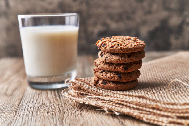 istock Delicious chocolate cookies on a wooden table 1356161608