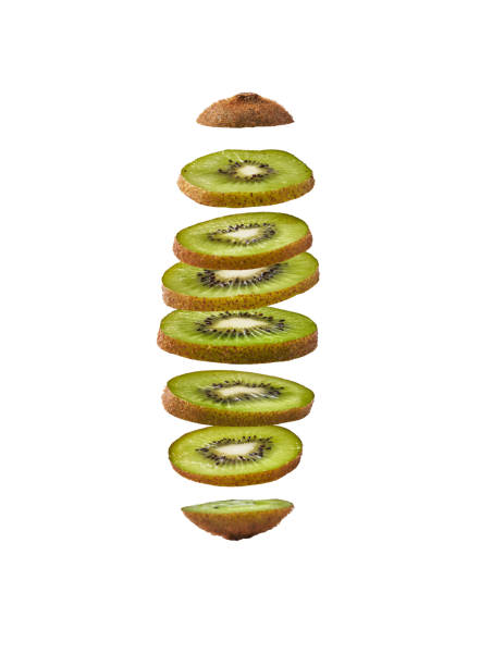 istock Slices of kiwi isolated on a white background 1356162122
