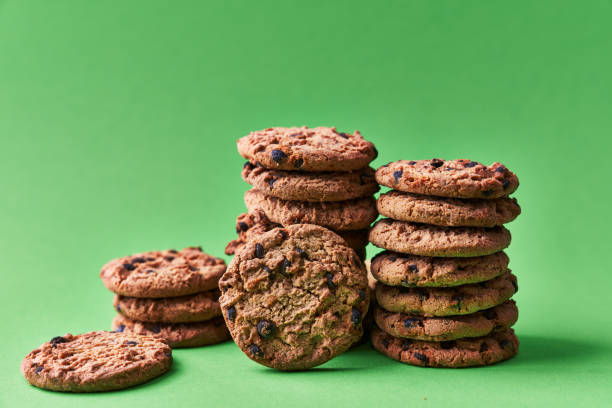 istock Delicious chocolate cookies on a green background 1356162135