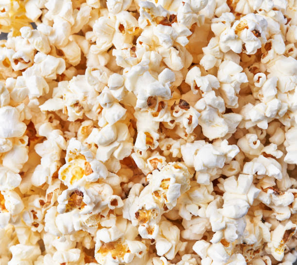 istock Bunch of salty popcorns texture 1356162874