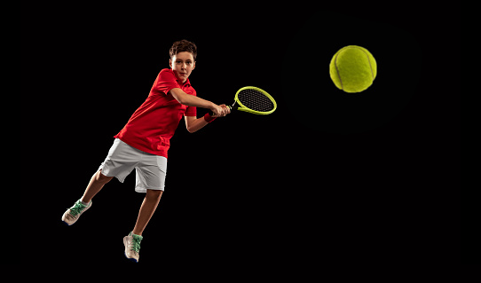 men tennis player is shooting onehand background on clay court horizontal tennis still