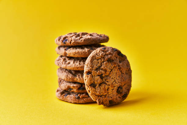istock Delicious chocolate cookies on a yellow background 1356163272