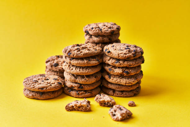 istock Delicious chocolate cookies on a yellow background 1356163385