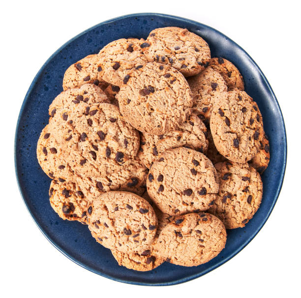 istock Plate of chocolate cookies isolated on a white background 1356163403