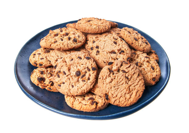 istock Plate of chocolate cookies isolated on a white background 1356163413