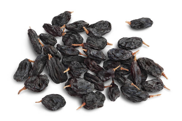 istock Black raisin isolated on white background with clipping path. Top view. Flat lay 1356164249