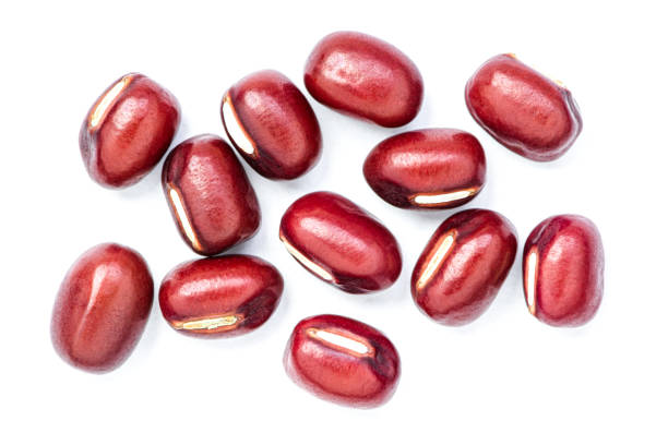 istock Red Azuki beans ( Adzuki or japanese red bean ) isolated on white background 1356164505