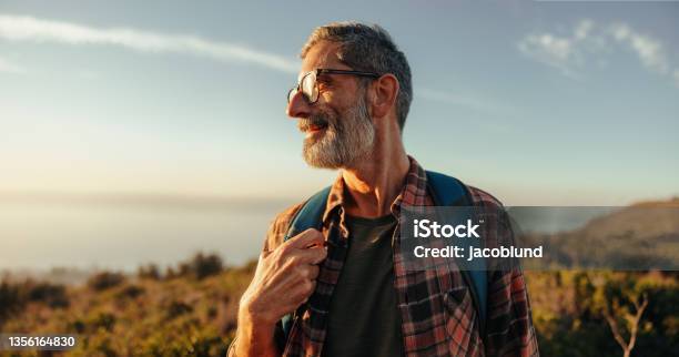 Enjoying The Hilltop Views Stock Photo - Download Image Now - Senior Adult, Hiking, Men