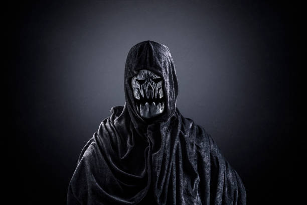 istock Creepy monster on dark misty background 1356165824