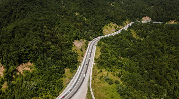 istock Mountain road in the mountains. Aerial view 1356165974