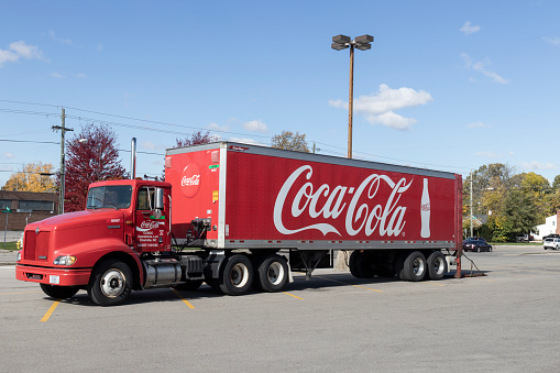 Muncie - Circa November 2021: Coca-Cola delivery truck. Coca-Cola manufactures Coke, Diet Coke, Sprite, Dasani, and various Coke coffee products.