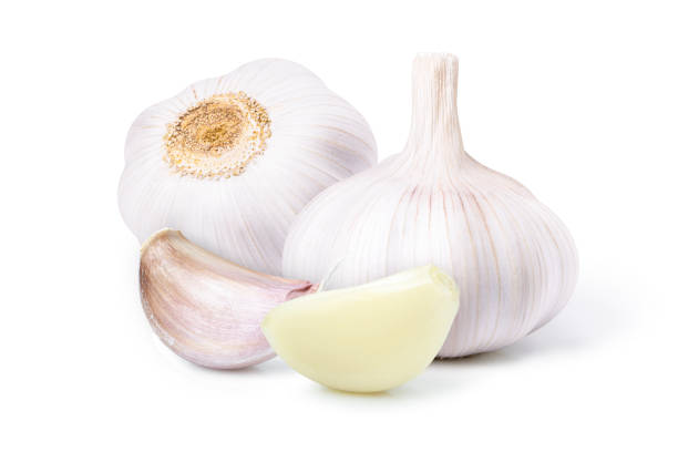 Garlic clove and bulb isolated on white Garlic clove and bulb isolated on white background. garlic bulb stock pictures, royalty-free photos & images