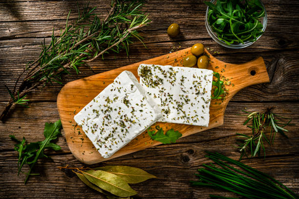 istock Feta cheese blocks shot from above on rustic table 1356167360