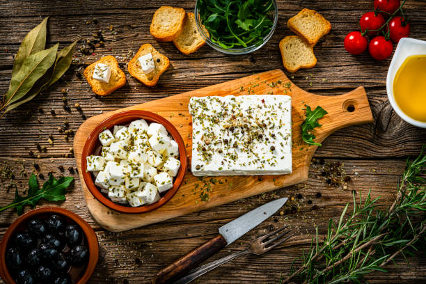 istock Greek feta cheese appetizer on rustic wooden table 1356167366