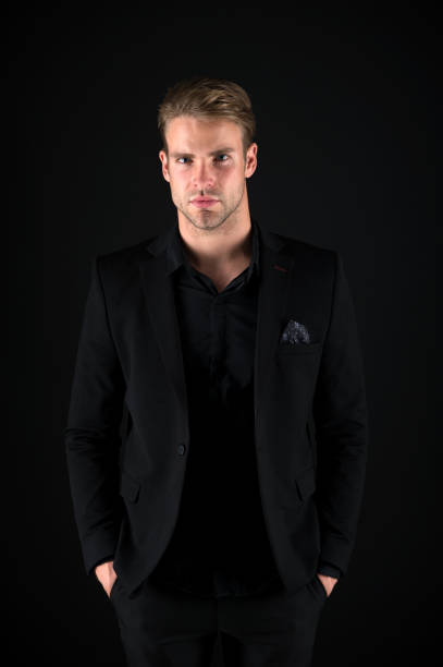 Feeling confident. Male beauty and masculinity. Guy attractive confident model. Confident in his style. Man in dark clothes. Casually handsome. Man handsome well groomed macho on black background.