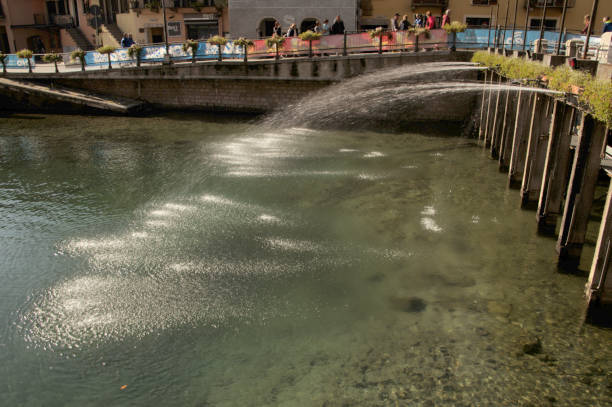 The Dubai Fountain - July 13, 2019,  Dubai, UAE. The Dubai Fountain in The Dubai Mall, world's largest choreographed fountain system set on the 30-acre at Burj Khalifa Lake