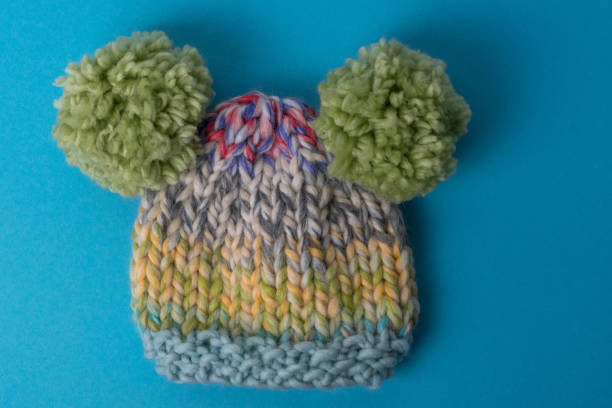 istock Hand knit hat for a baby 1356172024