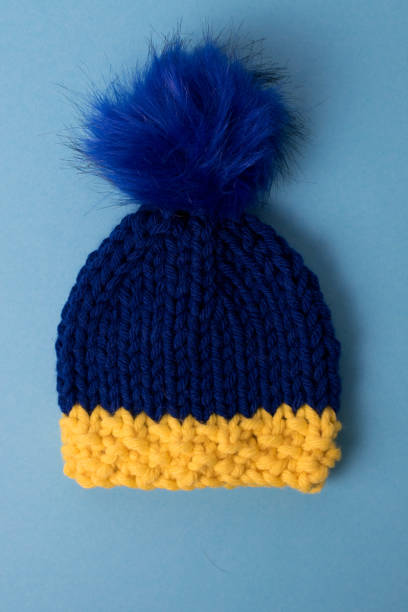 istock Hand knit hat for a baby 1356172035