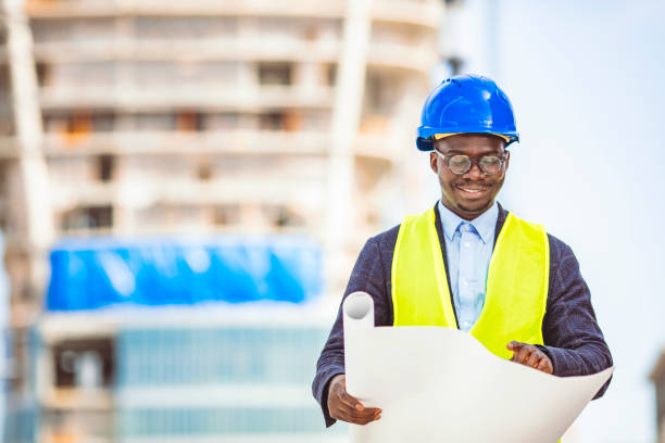 istock Portrait of an architect holding his helmet. 1356174886