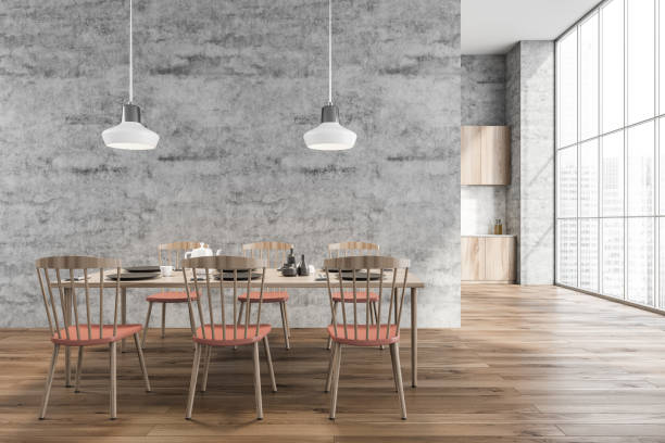 istock Modern grey dining room with white and coral pink details 1356174970