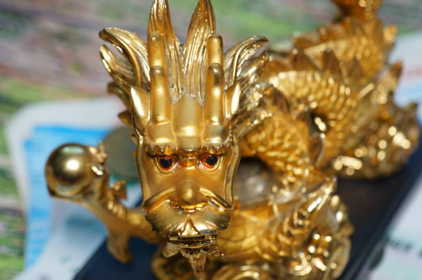 istock Dragon figurine close-up. Financial well-being. 1356175201
