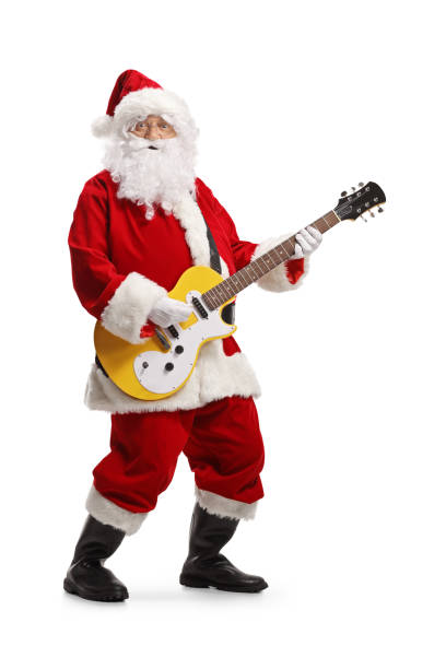 istock Santa claus dancing and playing an electirc guitar 1356175548