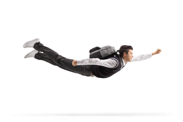 istock Teenage male student flying 1356175798