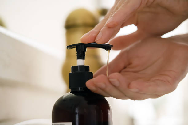 istock Girl washes her hands with soap. 1356176428
