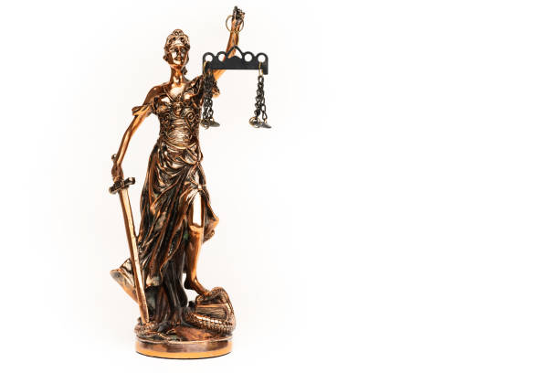 istock Justilia or Themis (Symbol of Justice) statue isolated on white background with clipping path 1356176442