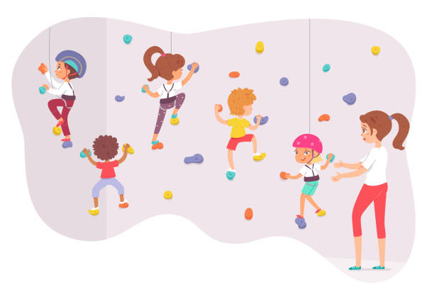 Children climbing rock wallm active boy girl climbers bouldering, training in gym Children climbing rock wall vector illustration. Cartoon active boy girl climber characters bouldering, active child training with woman trainer indoor in gym, extreme sport activity isolated on white extreem weer stock illustrations