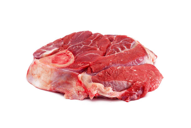 istock Raw steak with bone. Slice of beef isolated on white background. 1356178004