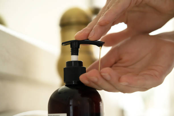 istock Girl washes her hands with soap. 1356179408