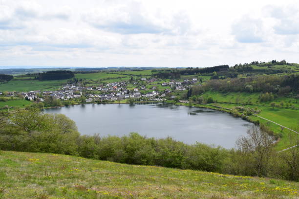 istock Schalkenmehrener Maar in spring 1356179997