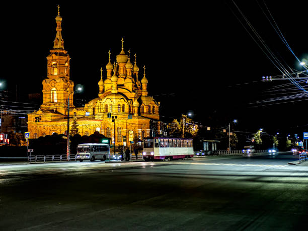night view of the building of the Church of the Holy Trinity on Kirov Street on an autumn evening in Chelyabinsk, against the background of a fantastic dark blue sky
