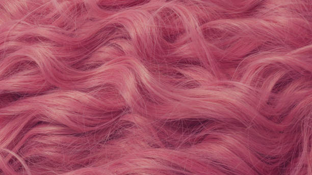 istock Pink wavy hair pattern. Top view. 1356185560