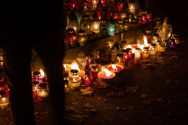 istock Cemetery Candle Lights At Night 1356187343