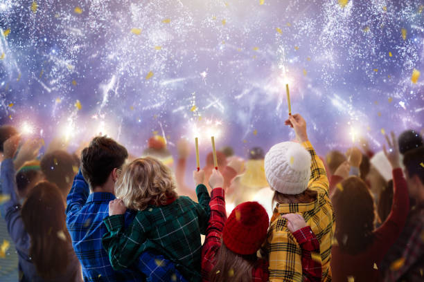 happy new year. crowd watching fireworks. - balloon child winter snow imagens e fotografias de stock