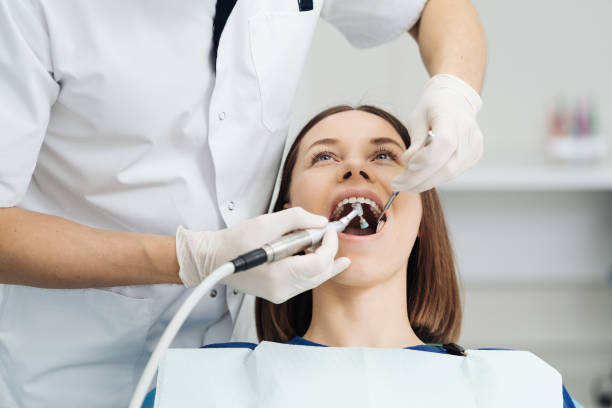 istock Oral hygiene, dentist doing Scaling and brushing procedure 1356189745