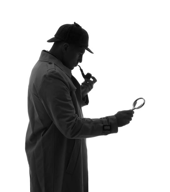 istock Old fashioned detective with smoking pipe and magnifying glass on white background 1356191463