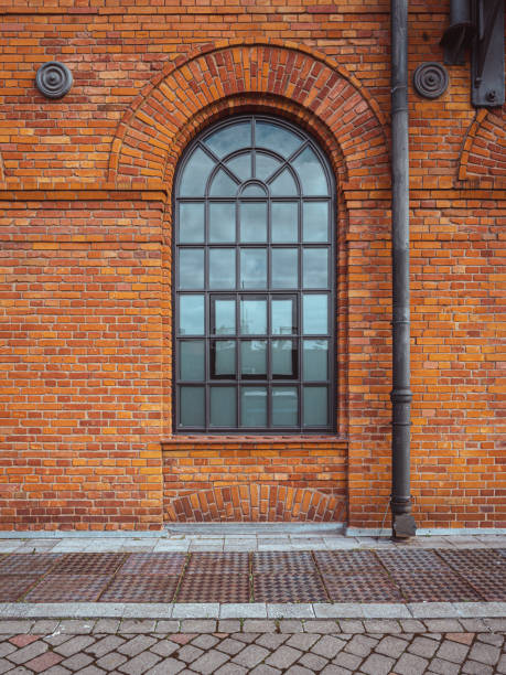 istock Traditional window and bricks of building 1356193420