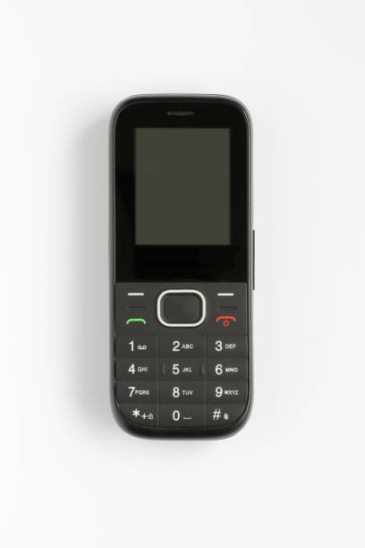 Picture of a man holding brick cell phone