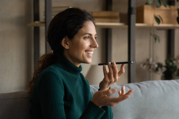 istock Inspired young hispanic woman enjoy using speech detection on smartphone 1356200642