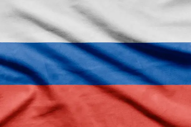 Photo of Russian flag on wavy fabric.