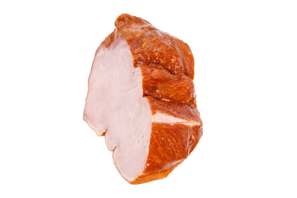 istock piece of ham isolated on white background. side view 1356201572